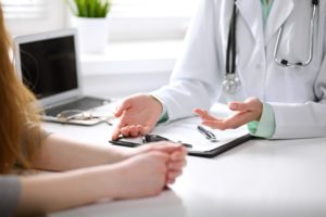 doctor talking to a patient
