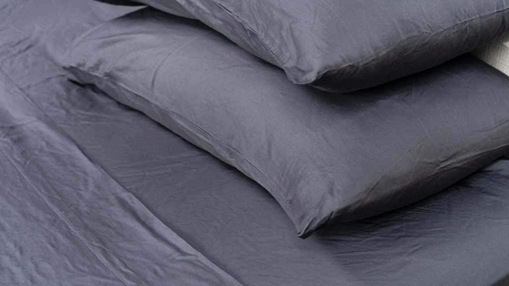 Best Cooling Sheets of 2025: Chill Layers for Hot Sleepers A picture of the Luxome Luxury Sheet Set in Sleep Foundation's test lab.