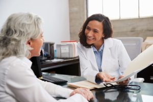 smiling doctor with a patient